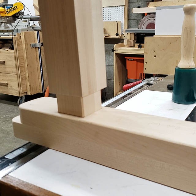 cutting joinery in the legs of the lathe stand