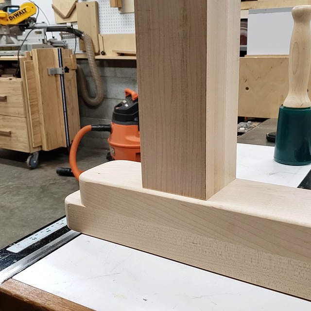 cutting joinery in the legs of the lathe stand