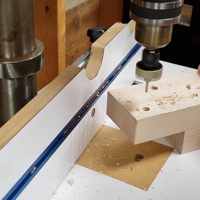 cutting joinery in the legs of the lathe stand