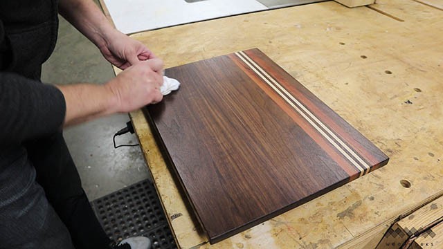 applying finish to cutting board