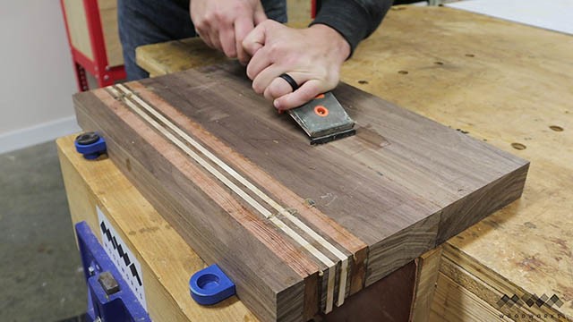 scraping glue from cutting board